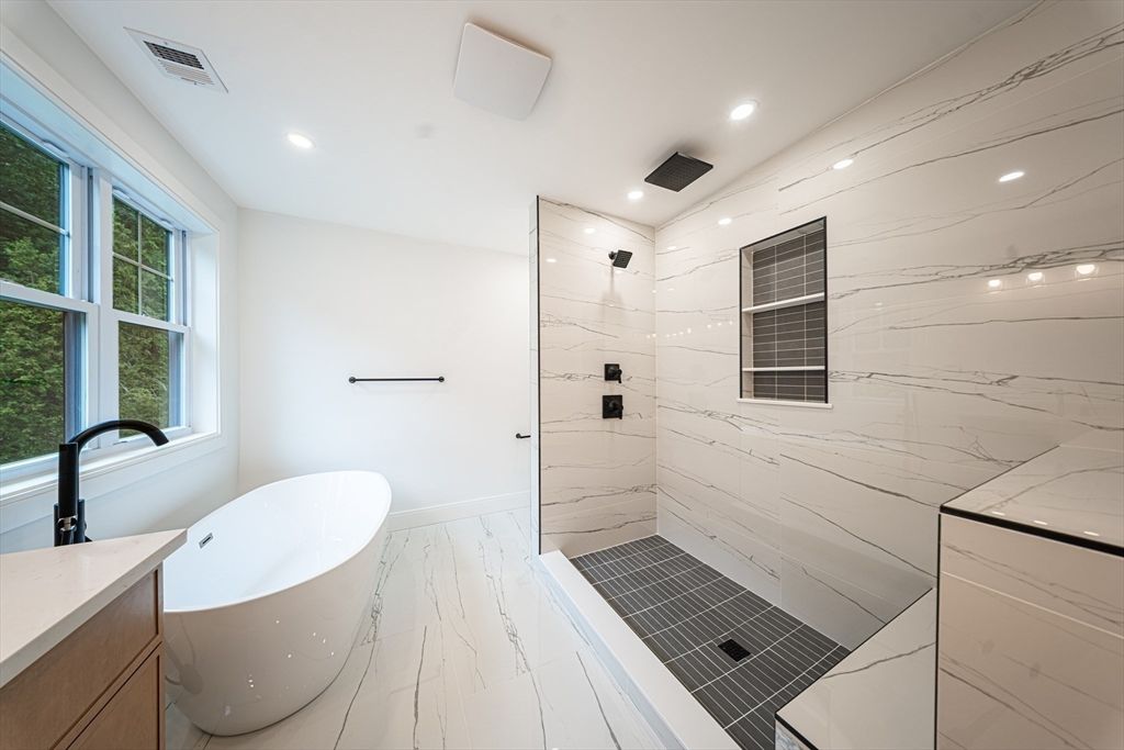 Bathroom, Free Standing Baths, Glass Shower, Interior, Marble, Marble Walls, Recessed Lighting