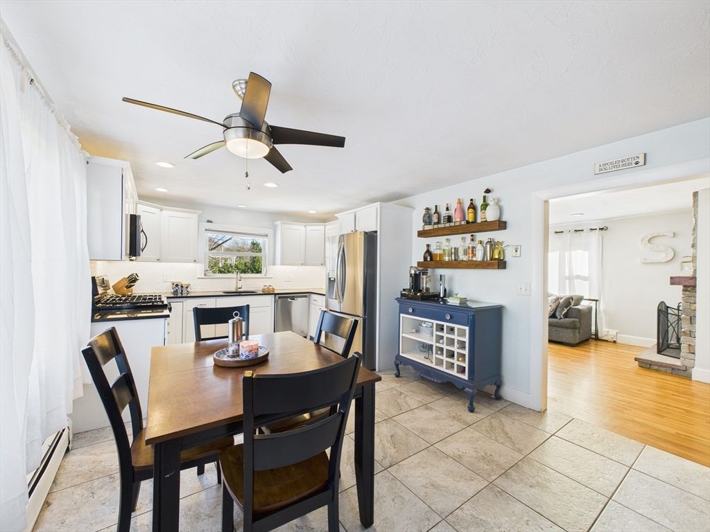 Dining room, Interior, Kitchen, Recessed Lighting, Stainless Steel Appliances, Wood Texture Flooring