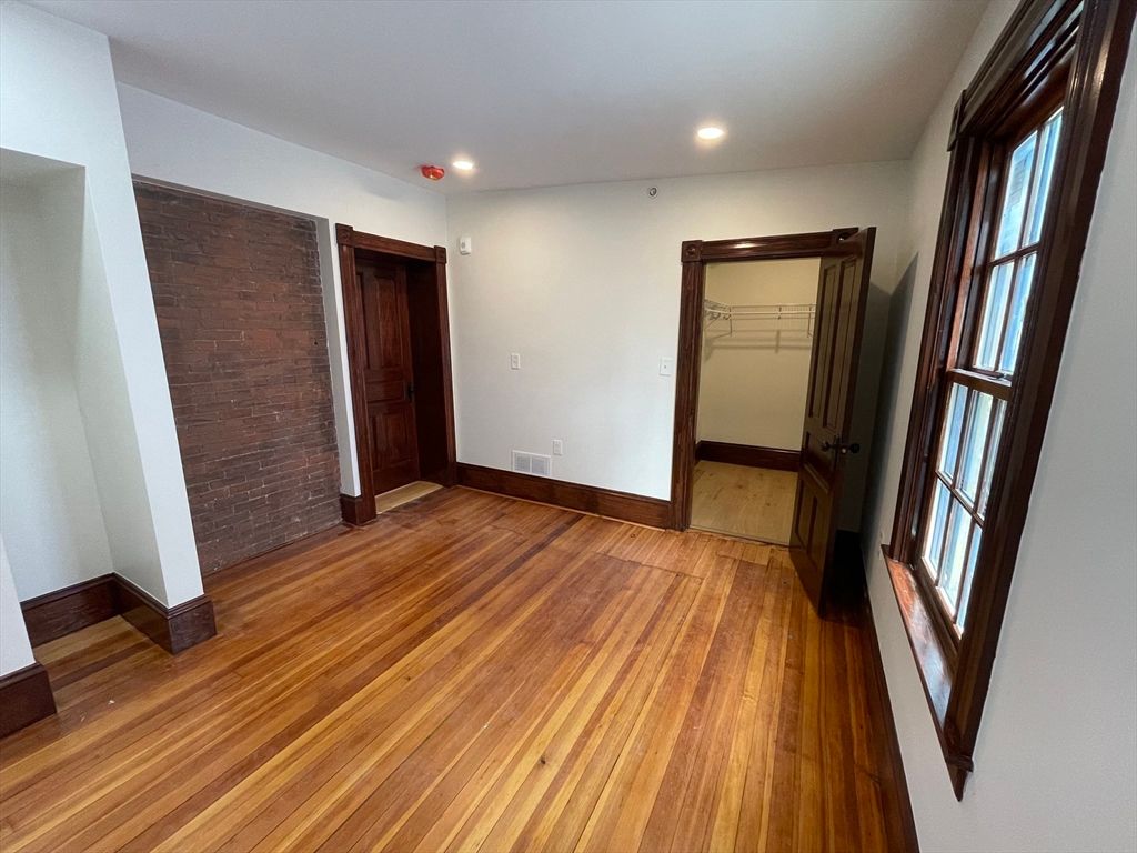 Empty room, Interior, Recessed Lighting, Stone Walls, Wood Texture Flooring