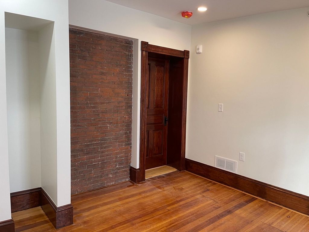 Empty room, Interior, Recessed Lighting, Stone Walls, Wood Texture Flooring