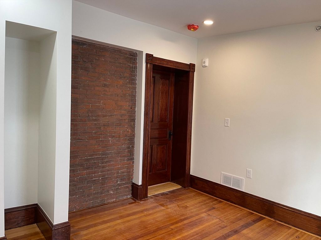 Empty room, Interior, Recessed Lighting, Stone Walls, Wood Texture Flooring