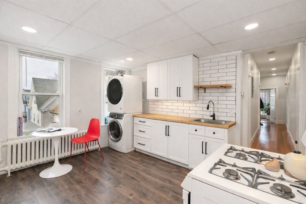 Interior, Kitchen, Recessed Lighting, Washer, Wood Texture Flooring