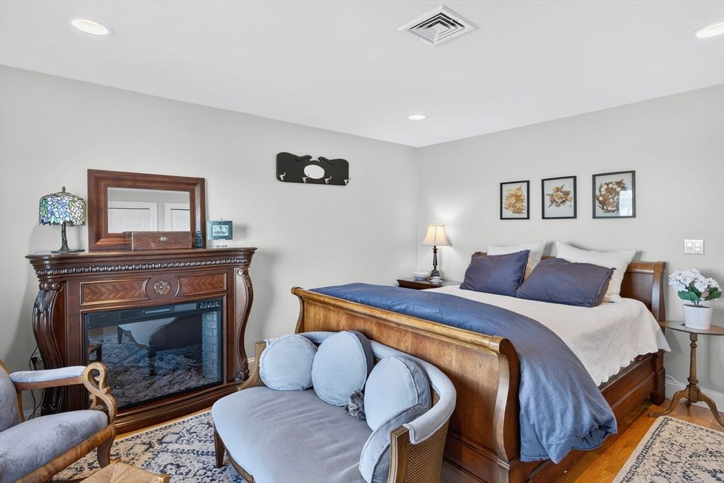 Bedroom, Fireplace, Interior, Recessed Lighting, Wood Texture Flooring