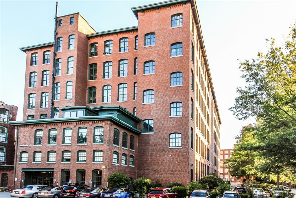 Exterior, Facade, Brick Facade, Condo Building