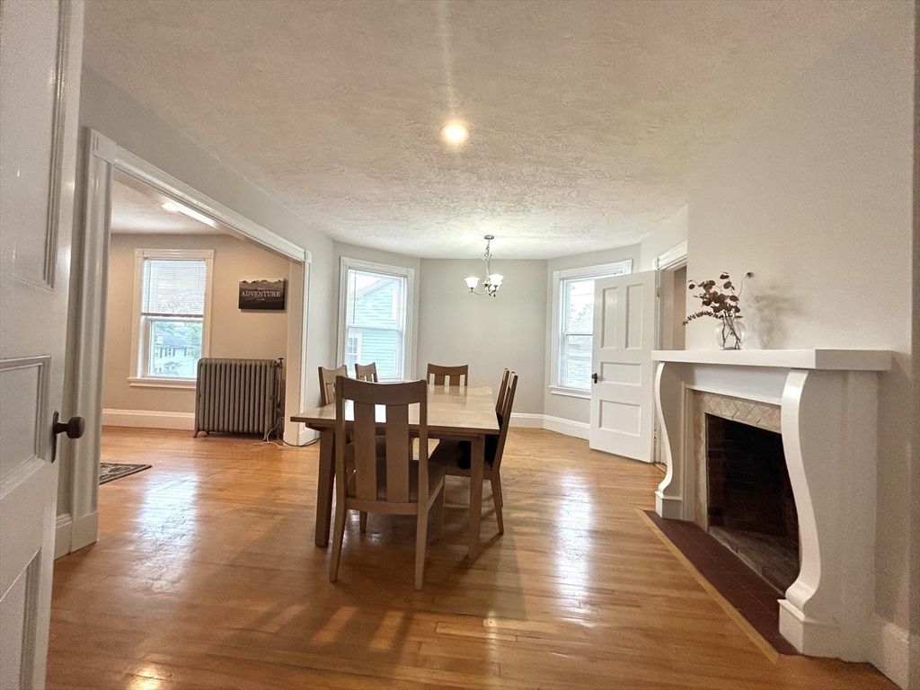 Chandelier, Dining room, Fireplace, Interior, Recessed Lighting, Wood Texture Flooring