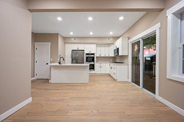 Interior, Kitchen, Recessed Lighting, Stainless Steel Appliances, Wood Texture Flooring