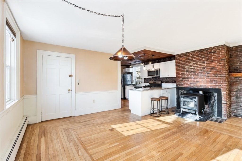 Fireplace, Interior, Kitchen, Pendant Lights, Stone Walls, Wood Texture Flooring