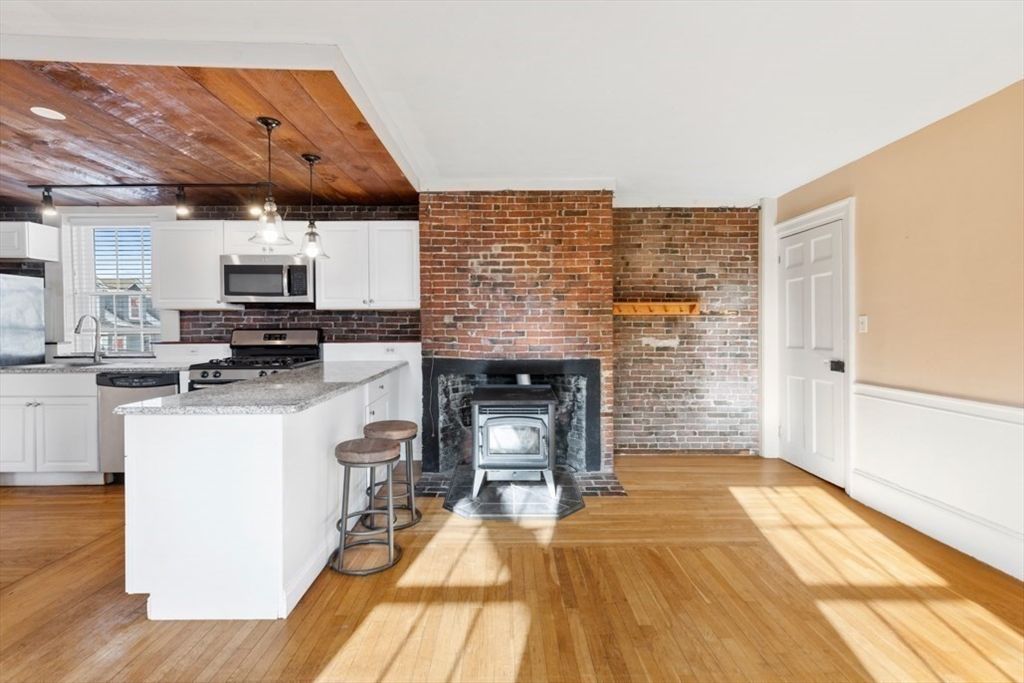 Fireplace, Interior, Kitchen, Pendant Lights, Stone Walls, Wood Texture Flooring