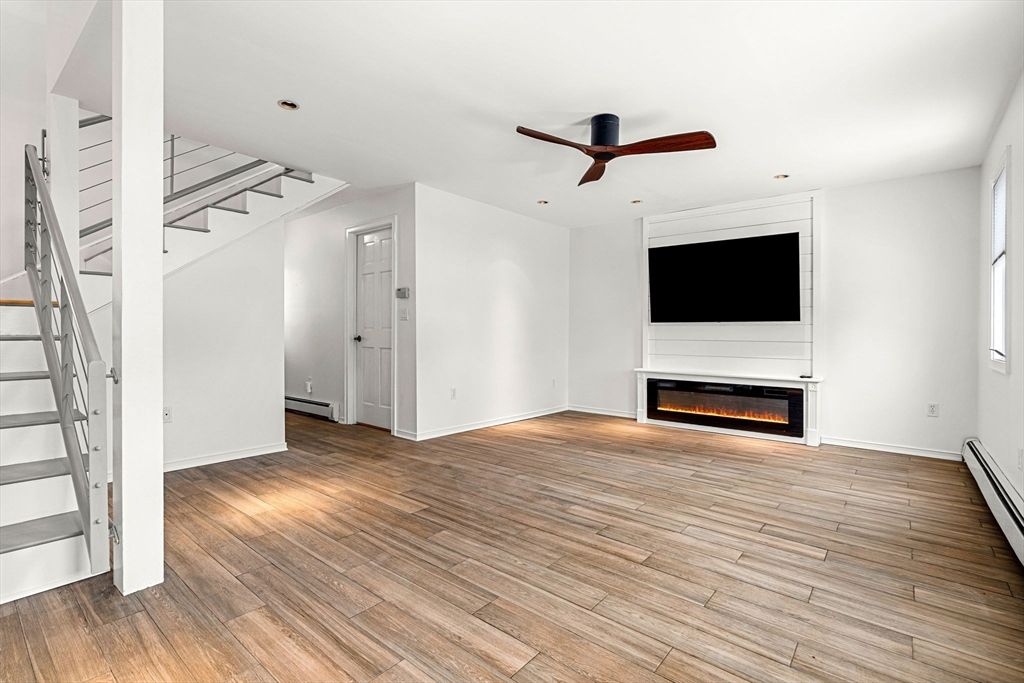 Empty room, Fireplace, Interior, Recessed Lighting, Wood Texture Flooring