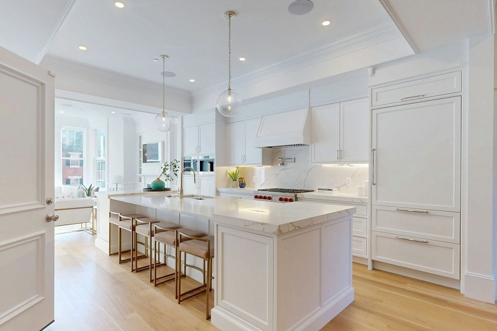 Interior, Kitchen, Marble Walls, Pendant Lights, Recessed Lighting, Stainless Steel Appliances, Wood Texture Flooring