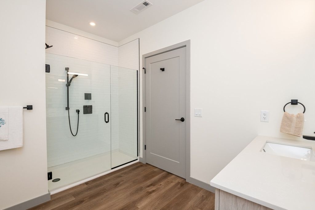 Bathroom, Glass Shower, Interior, Recessed Lighting, Wood Texture Flooring