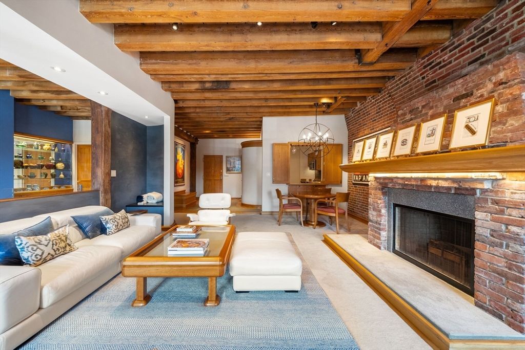 Chandelier, Dining room, Fireplace, Interior, Living room, Recessed Lighting, Stone Walls, Wooden Beams, Wooden Ceilings