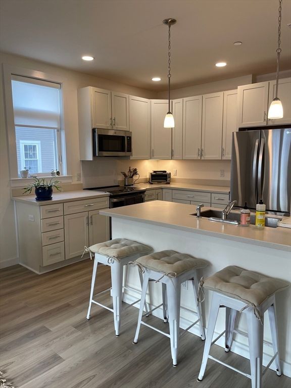 Interior, Kitchen, Pendant Lights, Recessed Lighting, Stainless Steel Appliances, Wood Texture Flooring