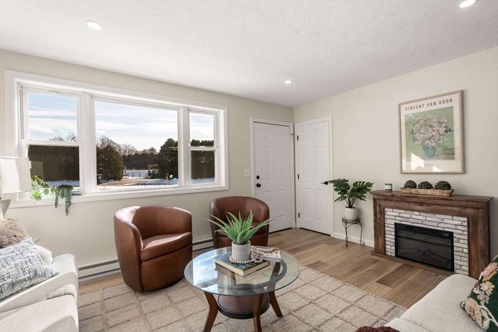 Fireplace, Interior, Living room, Recessed Lighting, Wood Texture Flooring