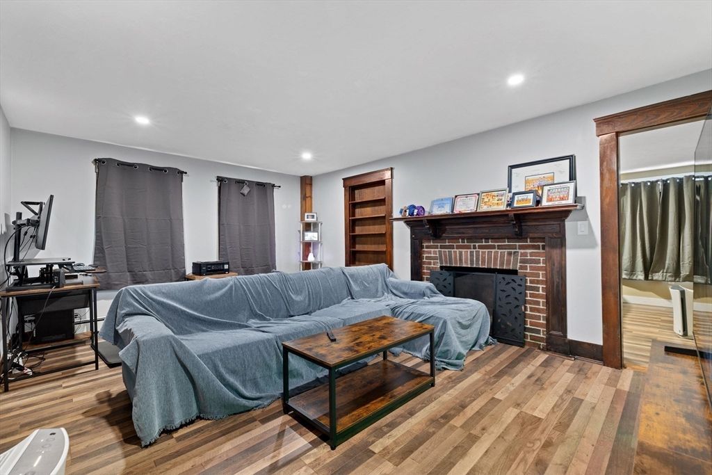 Fireplace, Interior, Living room, Recessed Lighting, Wood Texture Flooring