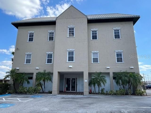 Attached, Exterior, Facade, Condo Building