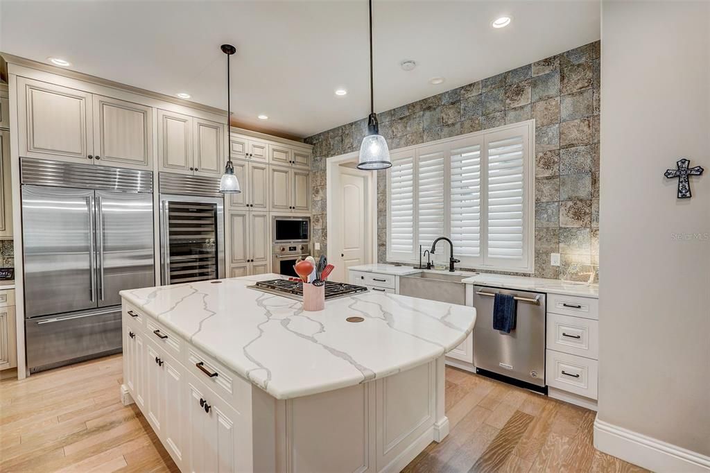 Interior, Kitchen, Pendant Lights, Recessed Lighting, Stainless Steel Appliances, Stone Walls, Wood Texture Flooring