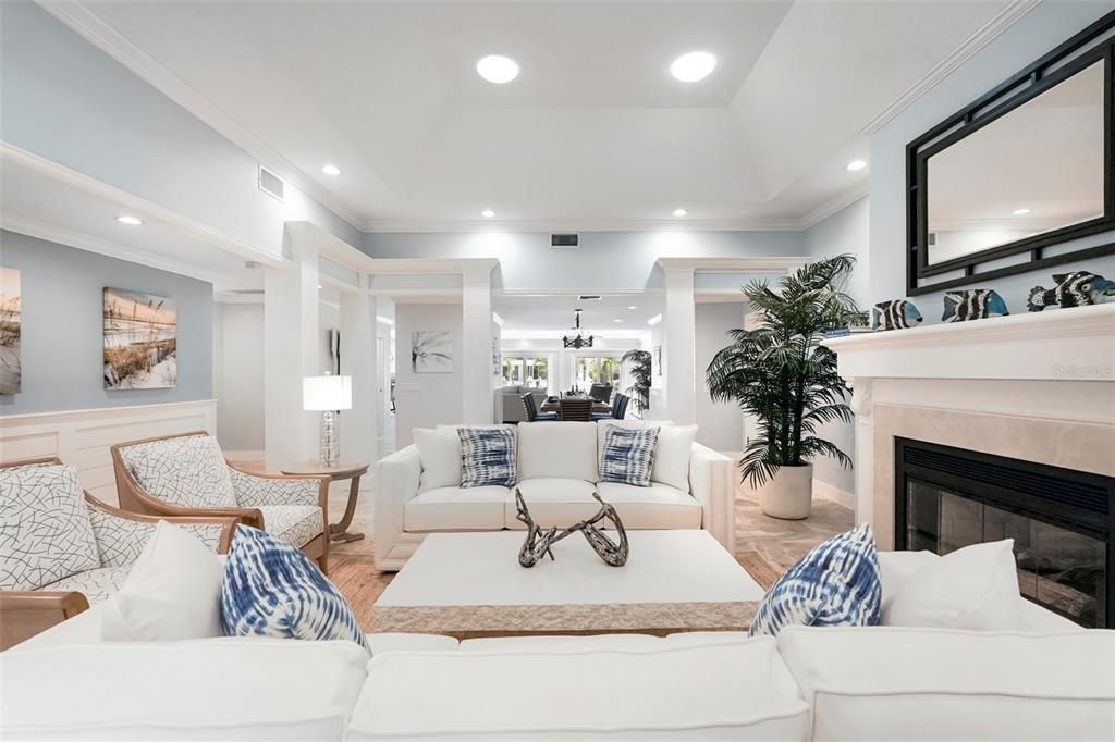 Dining room, Fireplace, Interior, Living room, Pendant Lights, Recessed Lighting, Wood Texture Flooring