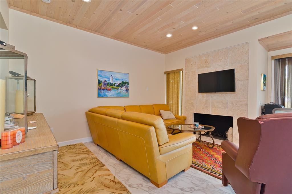 Fireplace, Interior, Living room, Marble, Recessed Lighting, Stone Walls, Wooden Ceilings
