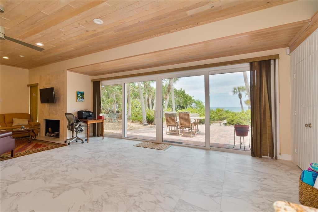 Fireplace, Home Office, Interior, Living room, Marble, Recessed Lighting, Water, Wooden Ceilings