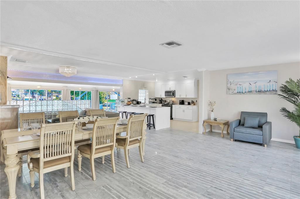 Interior, Kitchen, Wood Texture Flooring, Recessed Lighting, Living room, Dining room, Stainless Steel Appliances, Pendant Lights