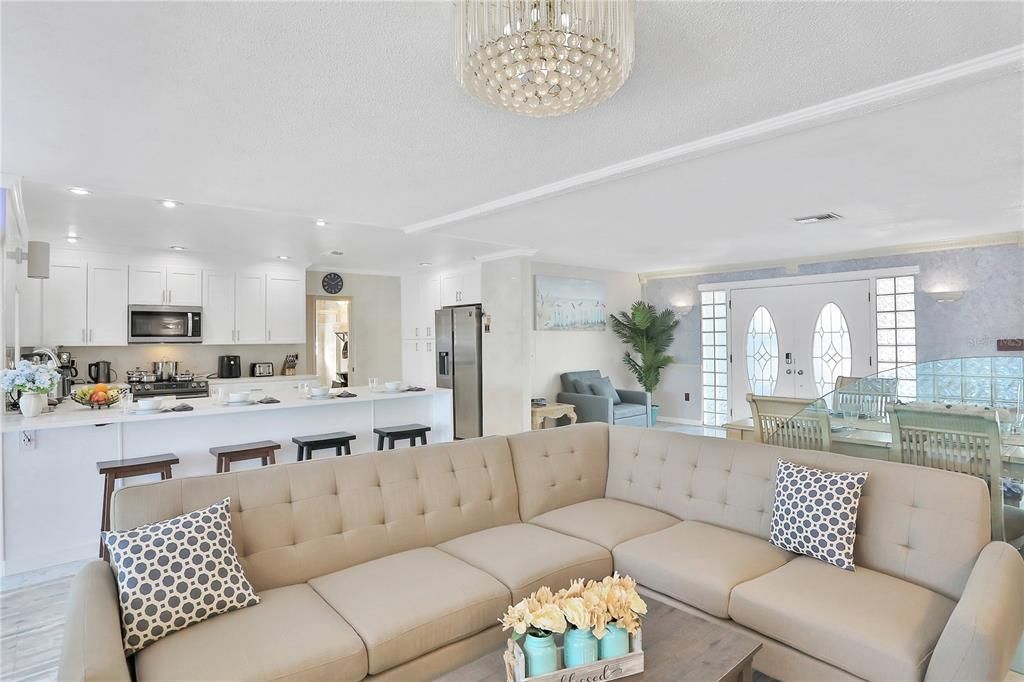 Interior, Kitchen, Wood Texture Flooring, Recessed Lighting, Living room, Dining room, Stainless Steel Appliances, Pendant Lights