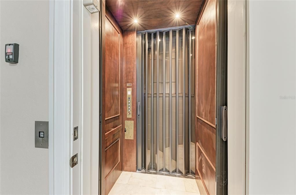 Elevator, Interior, Recessed Lighting, Wooden Ceilings, Wooden Walls