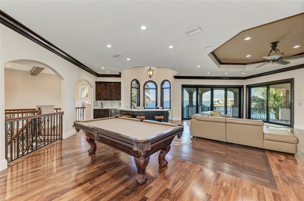 Billiard Table, Fireplace, Game Room, Interior, Living room, Recessed Lighting, Wood Texture Flooring