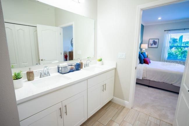 Bathroom, Bedroom, Dual Sink Vanities, Interior, Recessed Lighting, Wood Texture Flooring