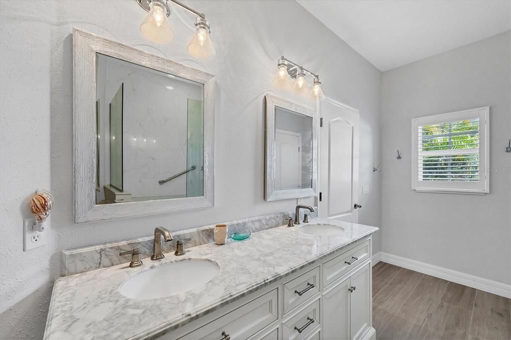Bathroom, Dual Sink Vanities, Interior, Marble Walls, Wood Texture Flooring