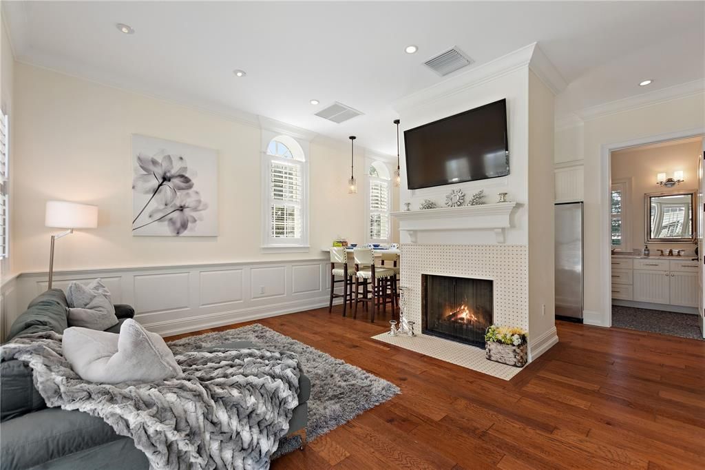 Dining room, Fireplace, Interior, Pendant Lights, Recessed Lighting, Wood Texture Flooring