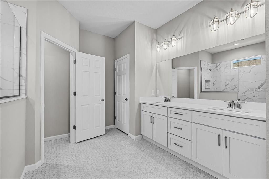 Bathroom, Dual Sink Vanities, Interior, Marble Walls, Recessed Lighting