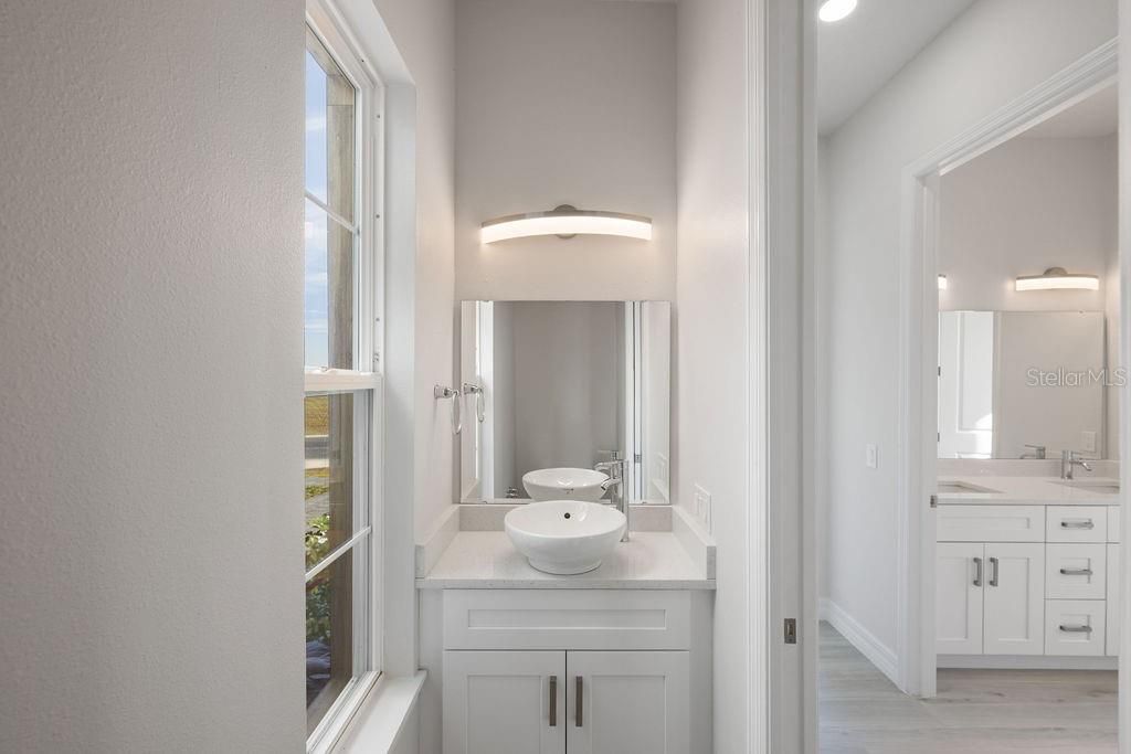 Bathroom, Dual Sink Vanities, Interior, Recessed Lighting, Wood Texture Flooring