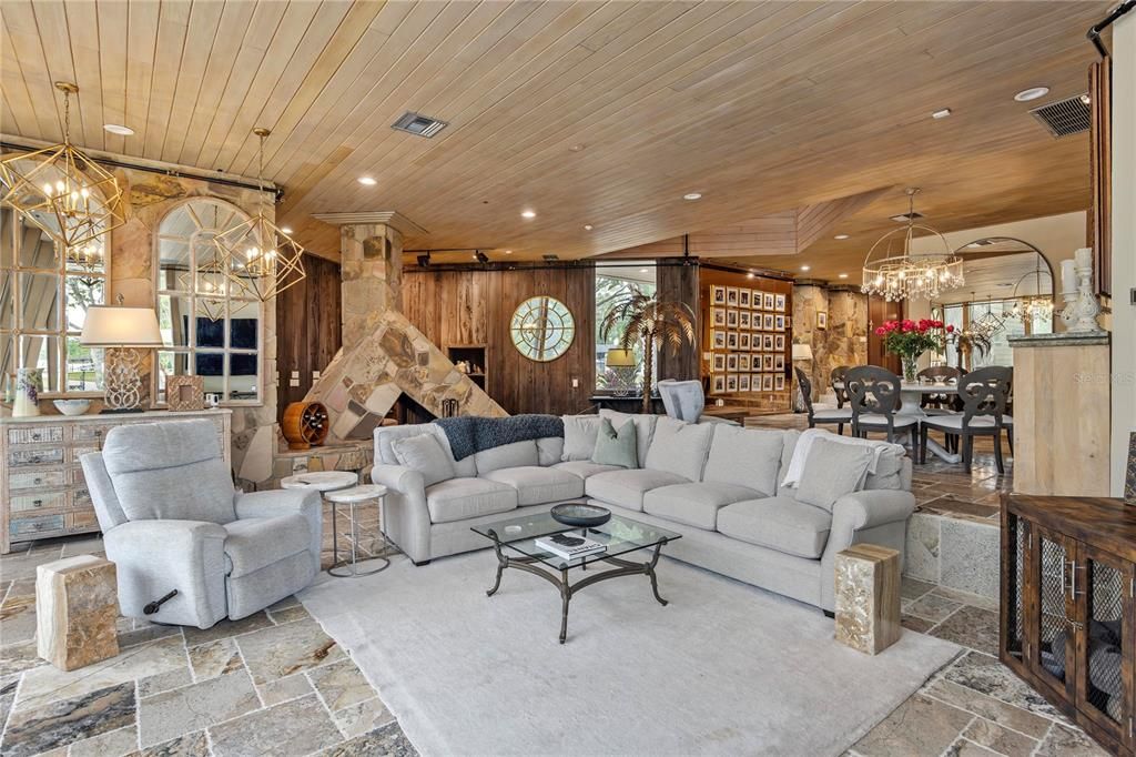 Chandelier, Dining room, Fireplace, Interior, Living room, Pendant Lights, Recessed Lighting, Wooden Ceilings