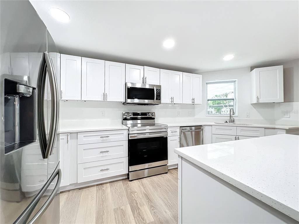 Interior, Kitchen, Recessed Lighting, Stainless Steel Appliances, Wood Texture Flooring