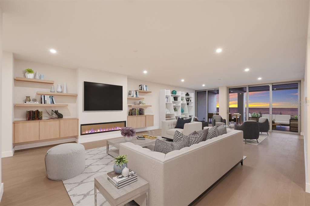 Dining room, Fireplace, Interior, Living room, Recessed Lighting, Water, Wood Texture Flooring