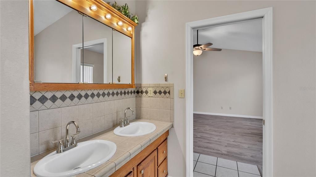 Bathroom, Dual Sink Vanities, Interior, Tile Countertops, Wood Texture Flooring