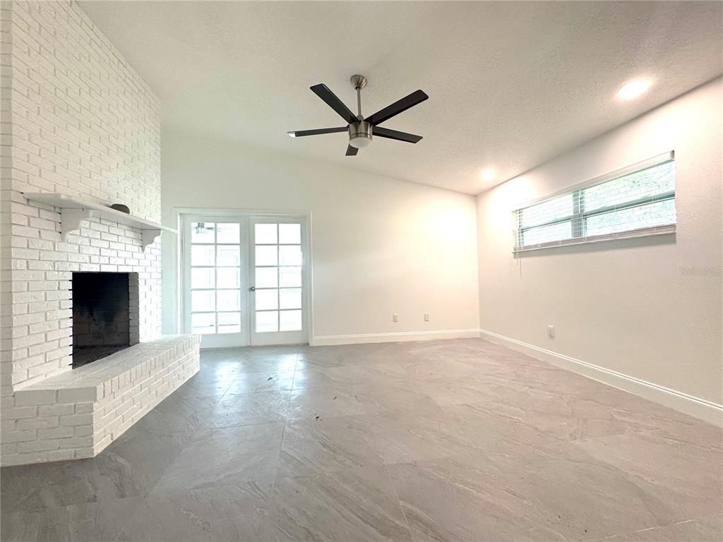 Empty room, Fireplace, Interior, Recessed Lighting, Stone Walls