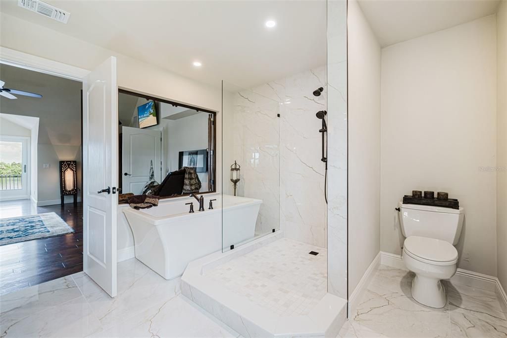 Bathroom, Glass Shower, Interior, Marble, Marble Walls, Recessed Lighting, Wood Texture Flooring