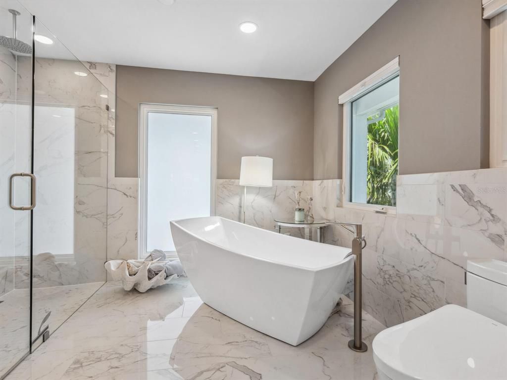 Bathroom, Free Standing Baths, Glass Shower, Interior, Marble, Marble Walls, Recessed Lighting