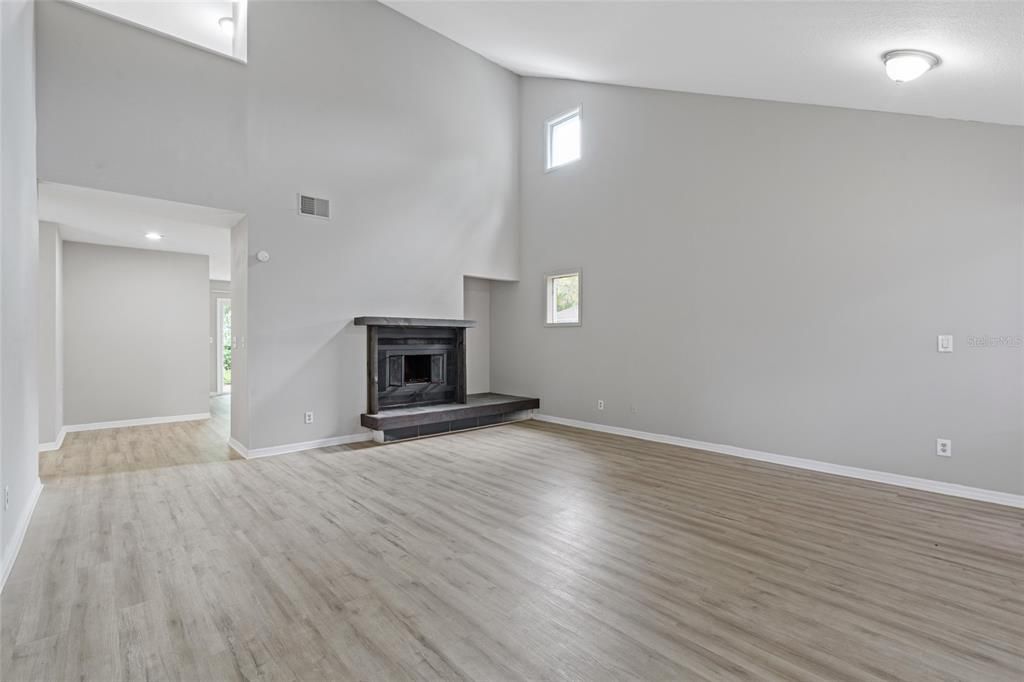 Empty room, Fireplace, Interior, Recessed Lighting, Wood Texture Flooring