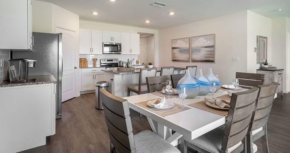 Dining room, Interior, Kitchen, Recessed Lighting, Stainless Steel Appliances, Wood Texture Flooring