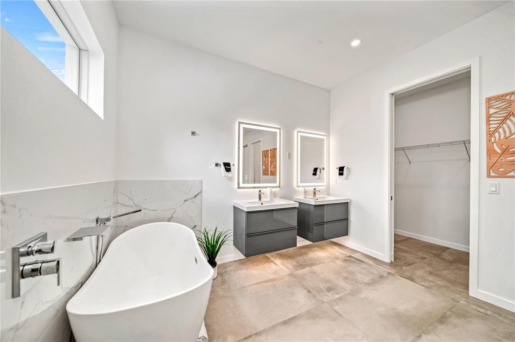 Bathroom, Dual Sink Vanities, Free Standing Baths, Interior, Marble Walls, Recessed Lighting
