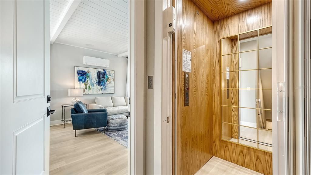 Elevator, Interior, Living room, Recessed Lighting, Wooden Ceilings, Wood Texture Flooring, Wooden Walls