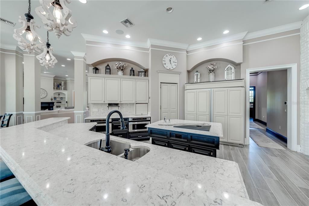 Chandelier, Interior, Kitchen, Recessed Lighting, Stainless Steel Appliances, Wood Texture Flooring