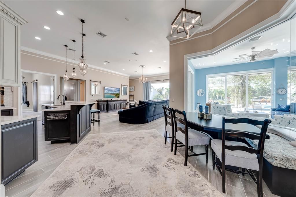 Chandelier, Dining room, Interior, Kitchen, Living room, Pendant Lights, Recessed Lighting, Wood Texture Flooring