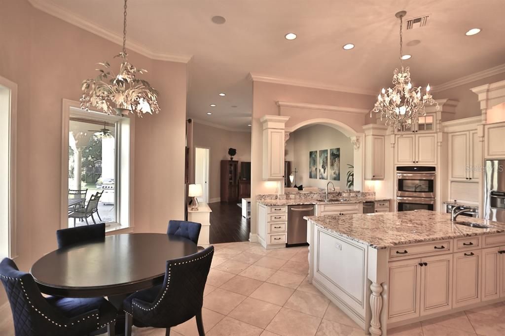 Chandelier, Dining room, Interior, Kitchen, Pendant Lights, Recessed Lighting, Stainless Steel Appliances