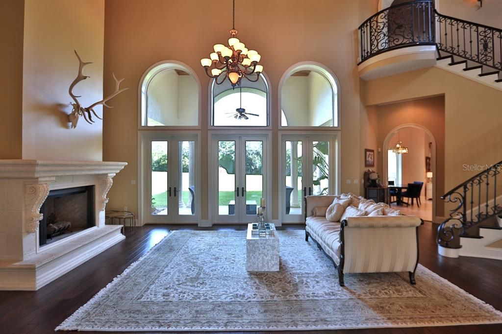 Chandelier, Dining room, Fireplace, Interior, Living room, Wood Texture Flooring