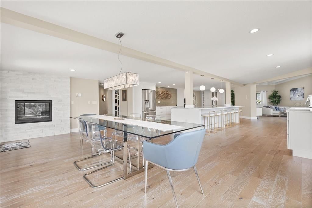 Chandelier, Dining room, Interior, Kitchen, Living room, Pendant Lights, Recessed Lighting, Stone Walls, Wood Texture Flooring