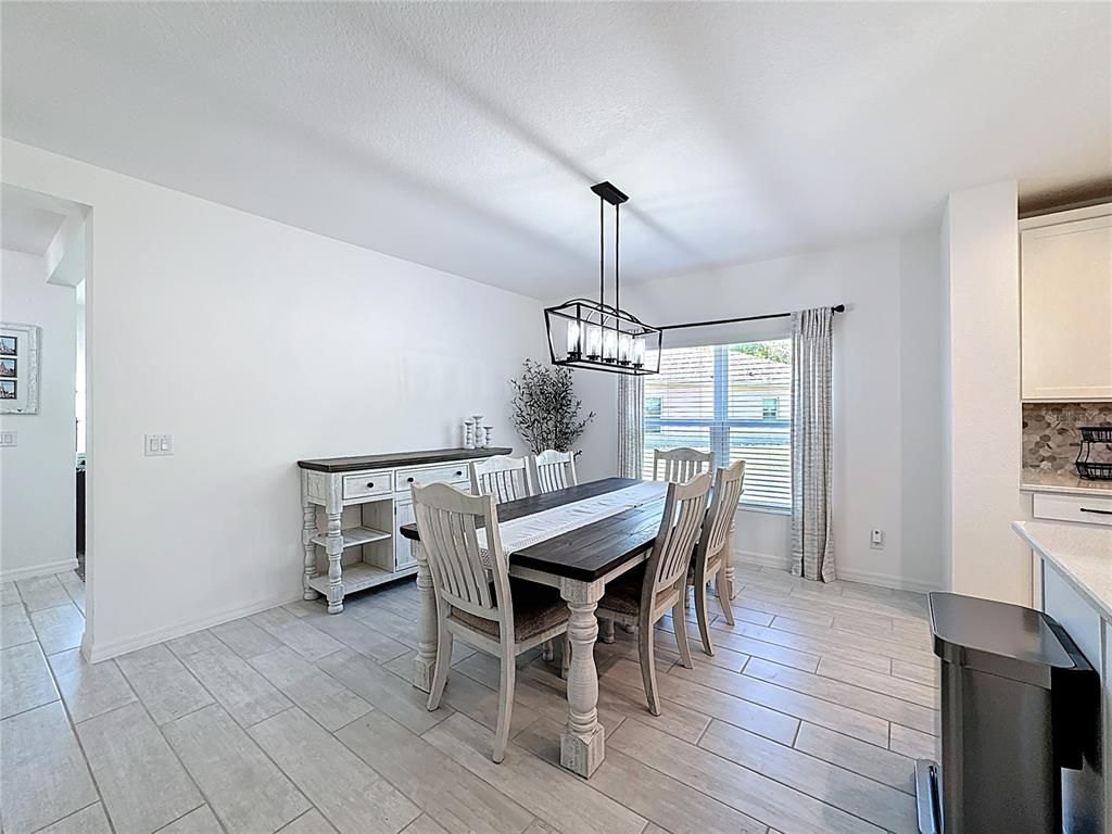 Chandelier, Dining room, Interior, Pendant Lights, Wood Texture Flooring
